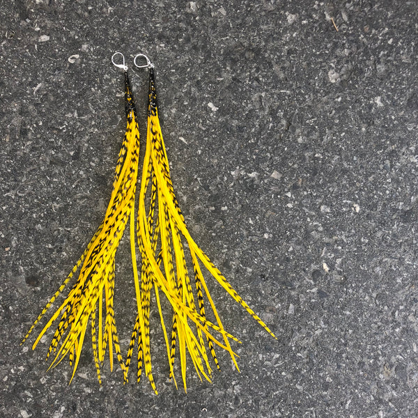 Yellow and black solid and grizzly feather earrings