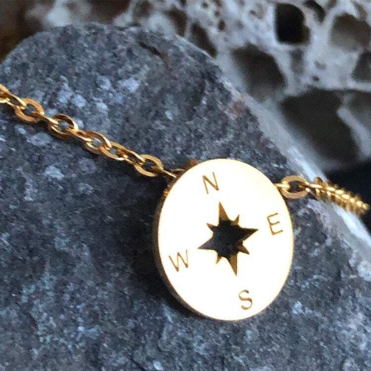 Stainless steel compass necklace