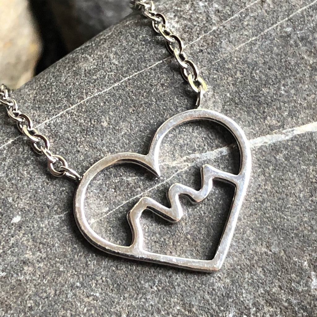Three Sisters Heart Mountain stainless steel necklace