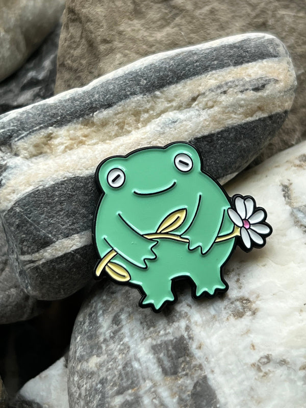 Flower holding Frog enamelled pin