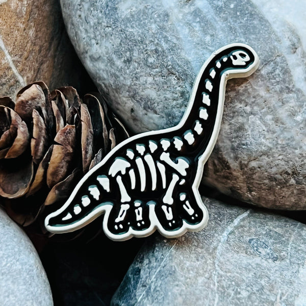 Dinosaur skeleton enamelled pin