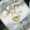 Stainless steel open work mountain scape necklace